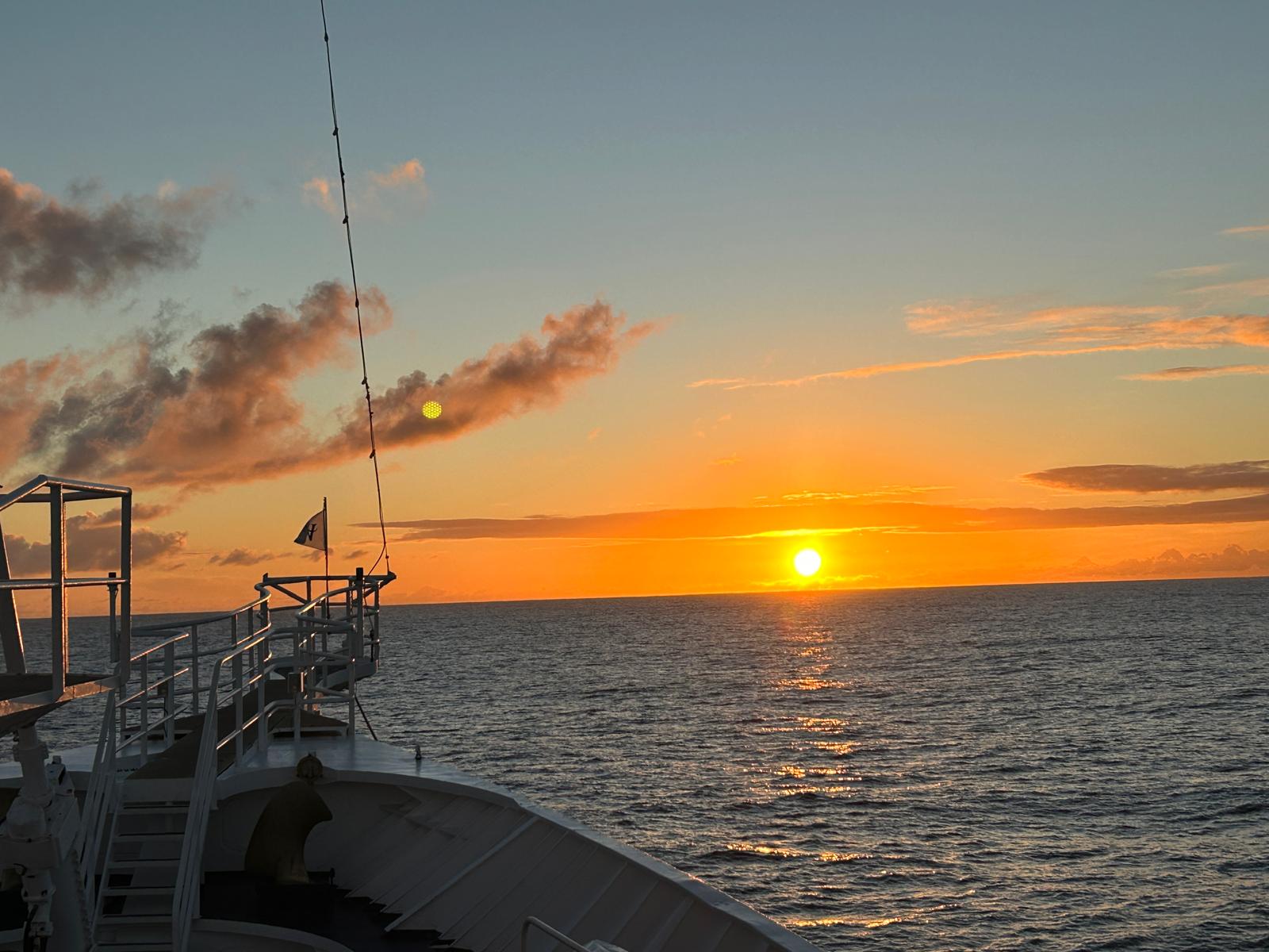 Rainbows and sunsets at sea
